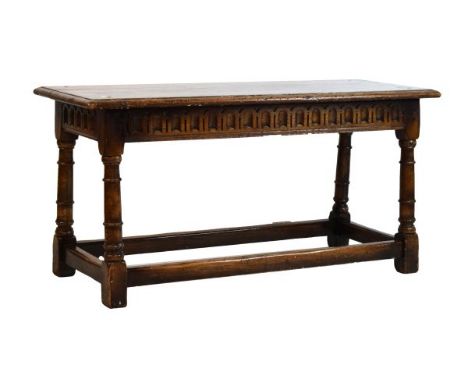 Good quality reproduction oak coffee table on bobbin turned supports   Condition: 