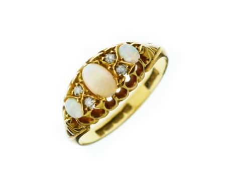 18ct gold ring set three opals interspersed by diamonds, size K   Condition: 