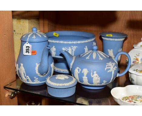 FIVE PIECES OF WEDGWOOD PALE BLUE JASPERWARE, comprising a pear shaped coffee pot, a circular trinket box and cover, a footed