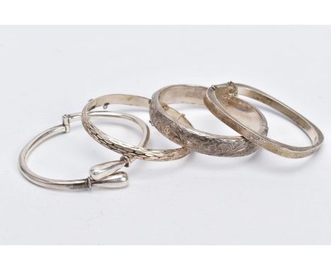 FOUR SILVER BANGLES, such as a floral engraved hinged bangle, with broken safety chain, hallmarked Birmingham 1961, approxima