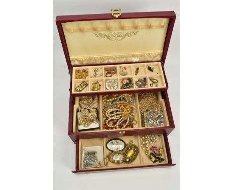 A JEWELLERY BOX WITH COSTUME JEWELLERY, the three tiered burgundy and gold trim jewellery box opens to reveal contents such a