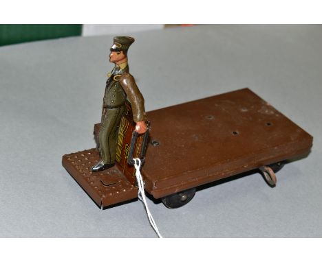 A TIPP &amp; CO TINPLATE CLOCKWORK STATION LUGGAGE TROLLEY, playworn condition, missing trunk, driver missing one arm but oth