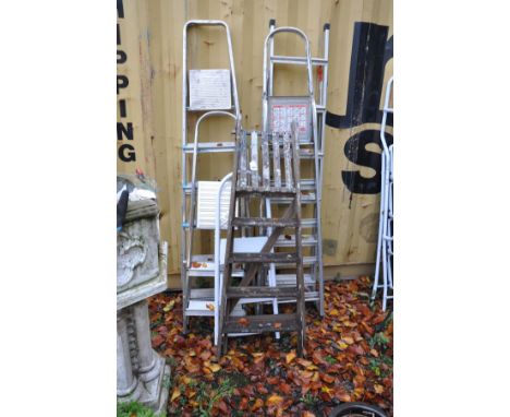 SIX STEP LADDERS, including one wooden, one steel and the rest Aluminium, tallest being 183cm high