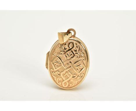 A 9CT GOLD LOCKET, of oval form, embossed Celtic cross and foliate design to the front, with a plain polished bail, hallmarke