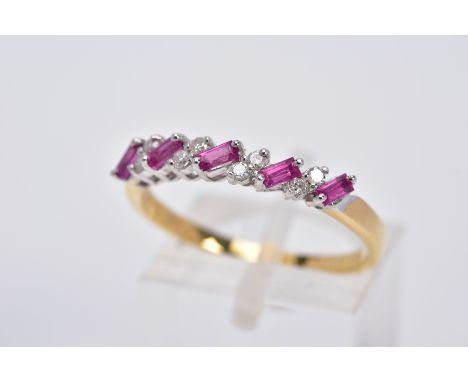 AN 18CT GOLD RUBY AND DIAMOND HALF HOOP RING, designed with a row of titled rectangular cut rubies, interspaced with round br