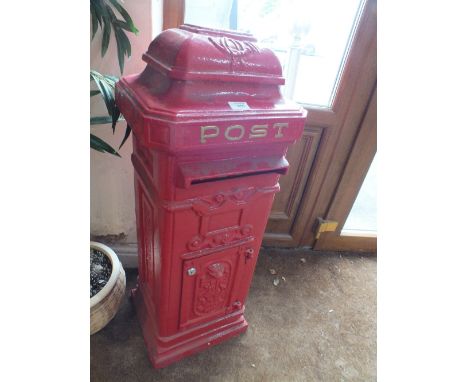 A CAST METAL POST BOX