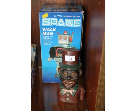 A VINTAGE LITTLE JOE MONEY BANK A/F TOGETHER WITH A BOXED WALKING ROBOT TOY 