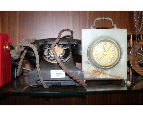 A VINTAGE TELEPHONE TOGETHER WITH AN ONYX MANTEL CLOCK (2)