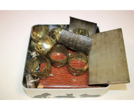 A TIN OF METALWARE TO INCLUDE A CIGARETTE CASE STAMPED 800, SALTS, NAPKIN RINGS ETC. 