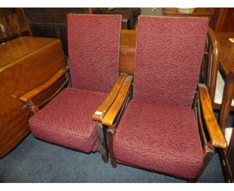A PAIR OF VINTAGE OAK FRAMED ARMCHAIRS