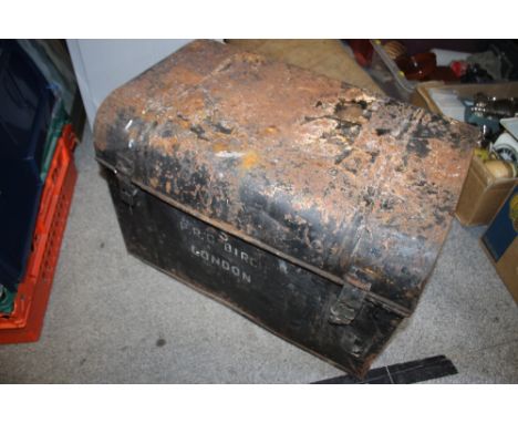 A VINTAGE DOME TOP TIN TRUCK
