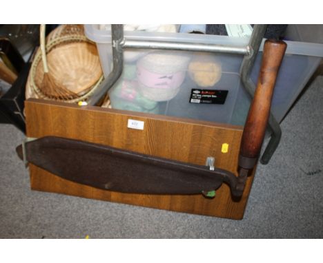 A VINTAGE WALL MOUNTED SICKLE