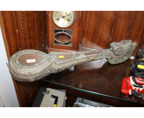 AN UNUSUAL EASTERN WORKED METAL STRING INSTRUMENT WITH HORSE HEAD FINIAL A/F