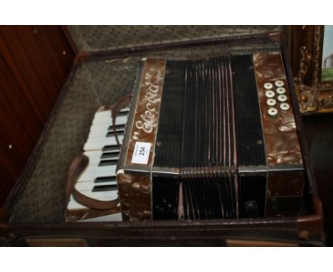 A BOXED VINTAGE ELECTICI ACCORDION 