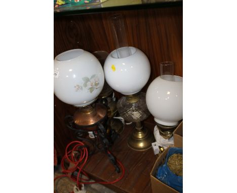 FOUR VINTAGE OIL LAMPS THREE CONVERTED TO ELECTRICITY, ONE ORIGINAL 