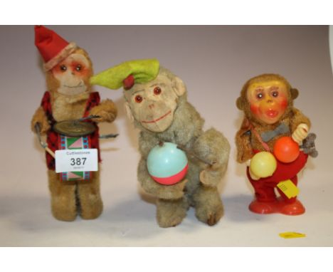 THREE VINTAGE WIND UP CLOCKWORK MONKEY 