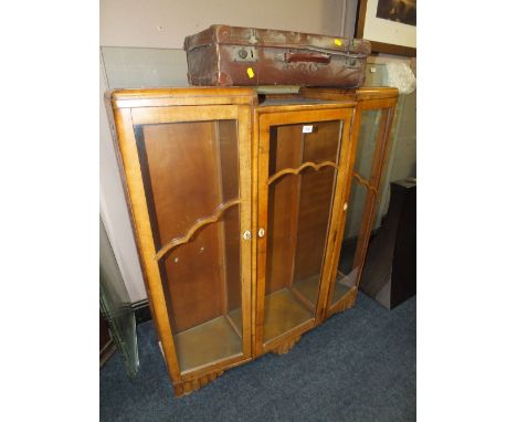 A WALNUT CHINA CABINET WITH A VINTAGE SUITCASE (2)