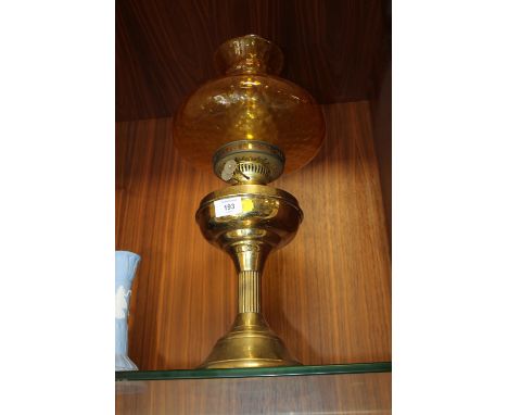 A VINTAGE OIL LAMP AND SHADE 