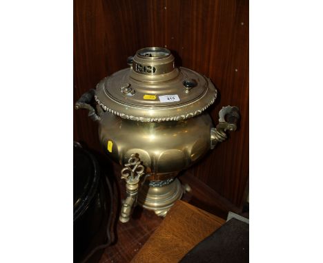 A VINTAGE BRASS TWIN HANDLED WATER STILL 