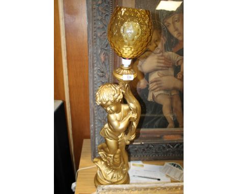A PLASTER CAST FIGURATIVE LAMP WITH RETRO SHADE 