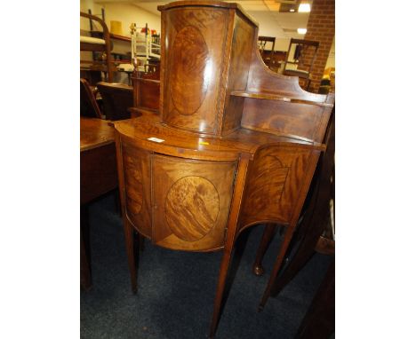 A 19TH CENTURY SHAPED COMMODE CABINET WITH INLAID OVAL PANELS RAISED ON TAPERED SUPPORTS, W 76 CM