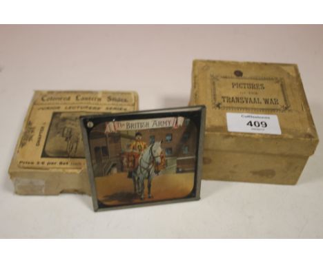 TWO BOXES OF VINTAGE COLOURED LANTERN SLIDES CIRCA 1900/02 OF THE TRANSVAAL WAR (12) & THE BRITISH ARMY (8 ) WITH PRINTED LEA