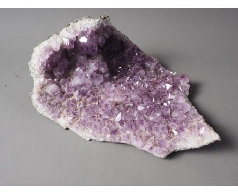 An amethyst mineral sample, 11" wide