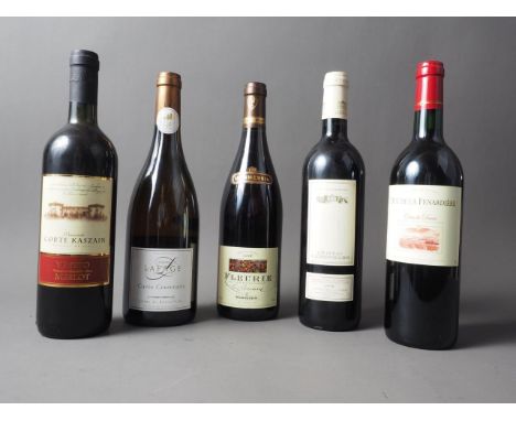 A bottle of 1998 Chateau Lezongars, a bottle of Domaine La Fage Cuvee Centenaire white wine, and three other bottles of red w