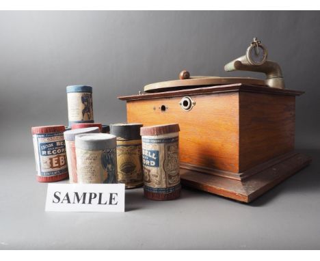 A quantity of phonograph wax cylinders in original packing, various, and an HMV record player