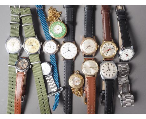 A gentleman's Technos Birka mechanical wind gilt metal cased wristwatch with Arabic numerals and arrowhead markers on a textu