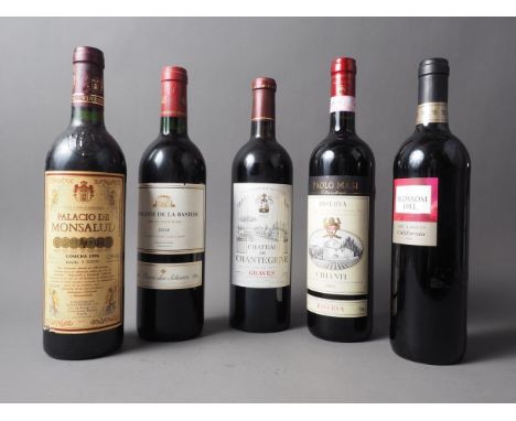 A bottle of 1997 Chateau De Chantegrive Graves, a bottle of 2004 Bergerie De La Bastide Terres Des Schistes, a bottle of 2003