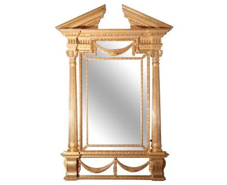 A LARGE GILTWOOD MIRROR IN THE MANNER OF JOHN AND FRANCIS BOOKER of recent manufacture, architectural form, the broken arch p