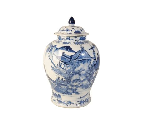 A CHINESE BLUE AND WHITE LIDDED VASE of baluster form, the body decorated with figures and pavilions in mountainous landscape