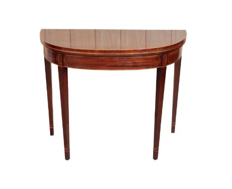 A GEORGE III MAHOGANY DEMI-LUNE CARD TABLE, last quarter 18th century, with sycamore strung edges and friezes, the interior w