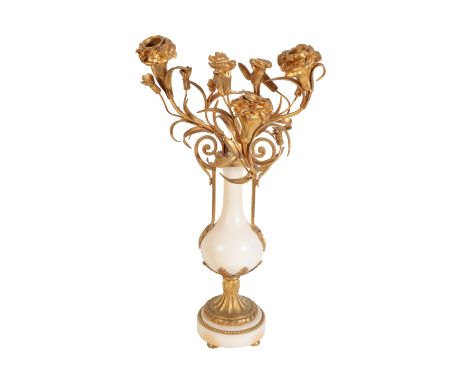 A GILT METAL AND STONE TABLE LAMP in Louis XV taste, each of the three branches modelled as a flower head, 44cm high