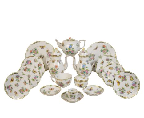 A HEREND PART TEA SERVICE pattern number 708, decorated with butterflies amongst foliage, with a green and gilt border, consi