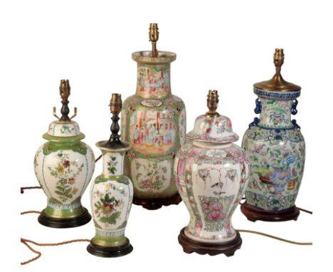 A GROUP OF FIVE CHINESE VASE LAMP BASES all with hardwood stands, the tallest 53cm overall