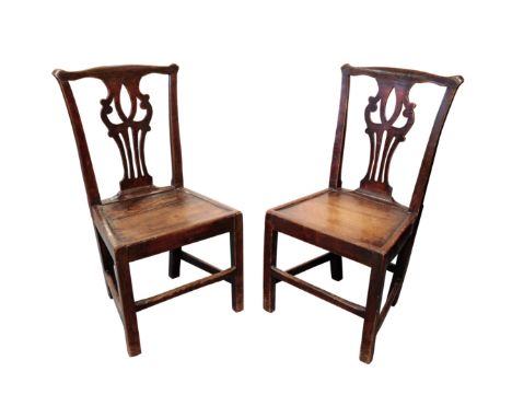 A PAIR OF GEORGE III 'COUNTRY CHIPPENDALE' ASH AND ELM SIDE CHAIRS, 18th century, each with pierced splat and solid seat; 94 