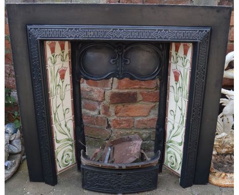 Art Nouveau style cast iron fireplace with tiled cheeks 96cm by 96cm