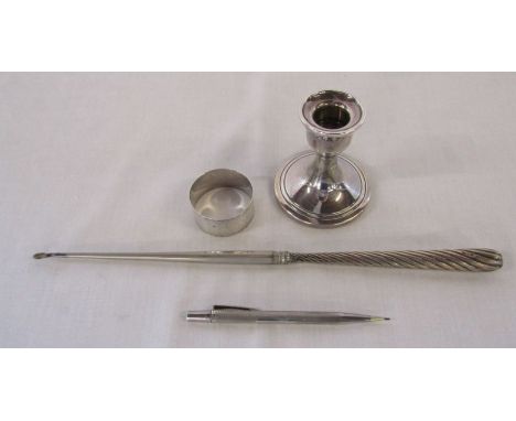 Silver Yard-o-led pencil London 1965, napkin ring Sheffield 1898 weight 0.63 ozt, candlestick Birmingham 1979 H 8 cm and a Vi