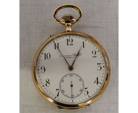 14k gold open face bezel wind pocket watch with white enamel dial and subsidiary seconds dial, maker International Watch Co S