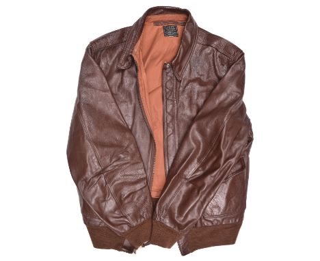 A modern copy of a US Army Air Force type A2 dark brown leather flying jacket, with “Sefton Clo. Co” label. Almost as new con