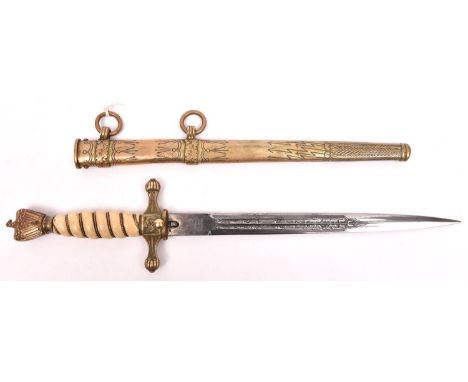 A Third Reich Naval officer’s dagger, the blade etched with entwined dolphins and fouled anchors, and with post war 1941 Eick