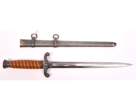 A Third Reich Army officer’s dagger, with post 1941 Eickhorn mark, orange grip, and silver plated mounts, in its sheath. GC P
