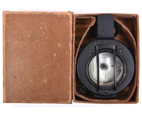 A WWII liquid filled prismatic marching compass, by “T.G. Co. Ltd, London”, number B4313, marked “1939 MkIII”, with glass gua