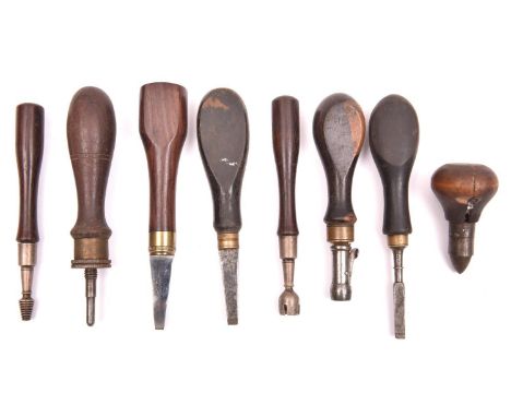 7 various old gun case accessories, all with wooden handles: two turnscrews, a pair of GS mounted small chamber cleaning tool