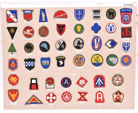 23 US Army Corps cloth patches, between 1 and 36, mounted on a card; also 33 US Army Division patches from 75 to 106th and 10