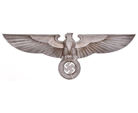 A large Third Reich case aluminium eagle, span 37", with angular body, the rear with two threaded holes for mounting. GC Prob
