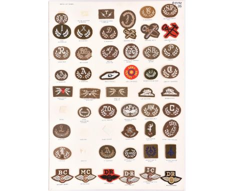Approximately 160 British Army cloth trade and proficiency badges, WWII type to current, identified and mounted on three card