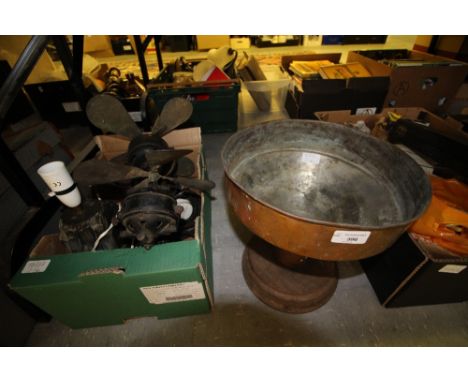 Box including vintage electric fan along with a copper spittoon